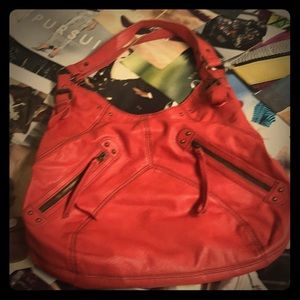Super cute Hobo bag NWOT. Color = Salmon.